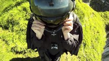 Jeb Corliss using a wing suit jumps from a cliff