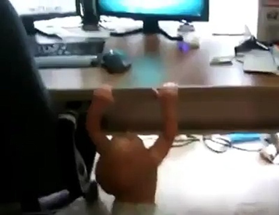 Baby does pull ups trying to watch cartoons
