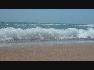 Sur la Plage soleil repos au son des vagues ?