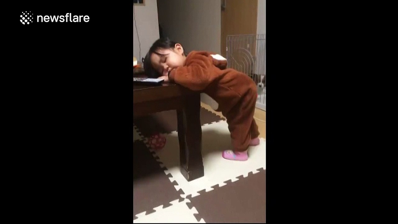 Youngster nods off while standing up