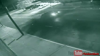 Cops & Civilians Pull Motorcyclist Out From Under Car After Crash