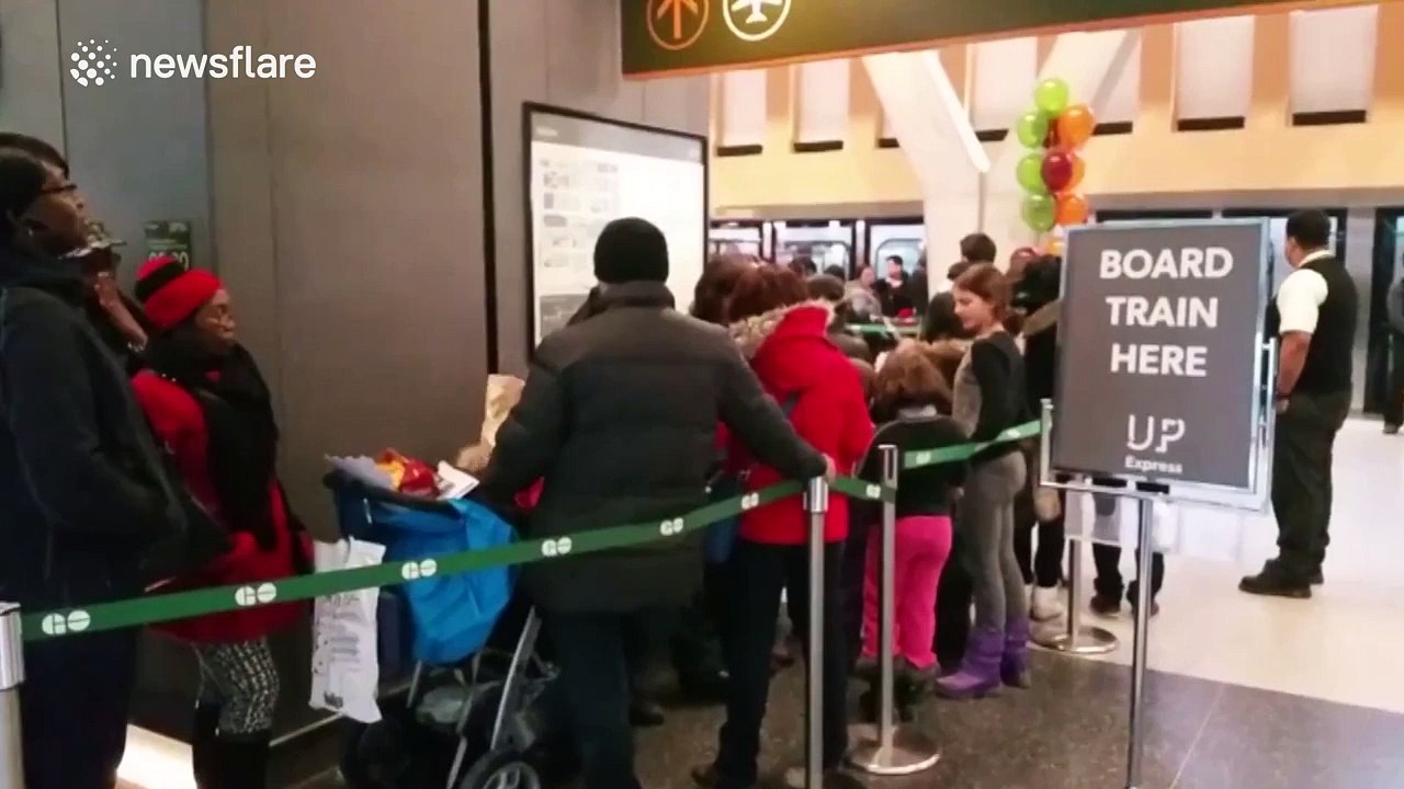 Man films ridiculously long train queue