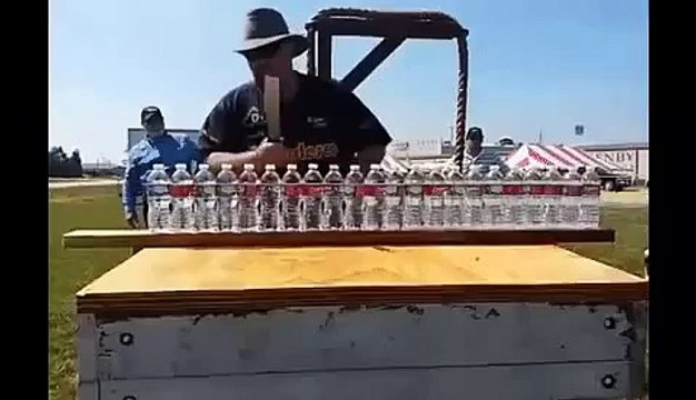 Cutting 22 bottles of water with a very sharp knife