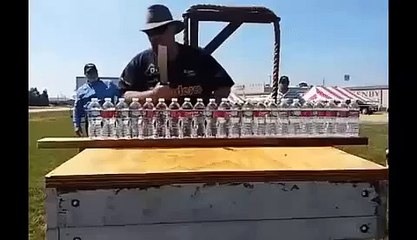 Cutting 22 bottles of water with a very sharp knife