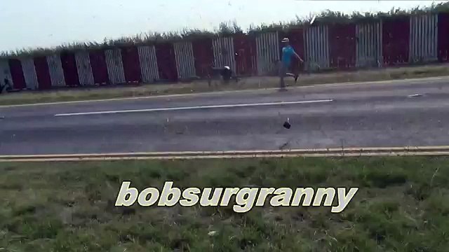 WW2 Lancaster Bomber Flypast Over Quiet Village.