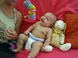 3 month old baby hysterically laughing at funny worm