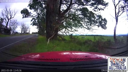 Incredible near miss at 100kph - BMW nearly flips!