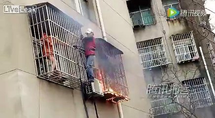 Man rescues woman from burning room on 3rd floor