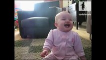 Baby Girl Laughing Hysterically at Dog Eating Popcorn