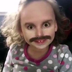 strange kid with a grotesque face