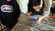 Mom Pranks Son with Water Bottle