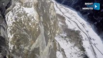 Wingsuit Pilot Casually Glides Through a Beautiful Swiss Waterfall
