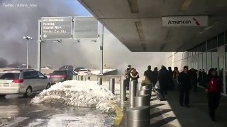 Smoke arises at LaGuardia Airport entrance after car explodes