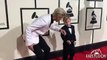 Big Brother Justin Bieber showing Jaxon Bieber the ropes at the 58th GRAMMY Awards