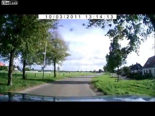 Car rides on a red traffic signal on roadblock