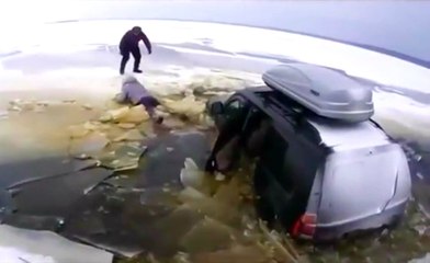 Idiot Tries To Jump Thin Ice In His SUV