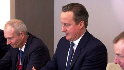 Cameron tells Tusk he's 'happy to stay until Sunday'
