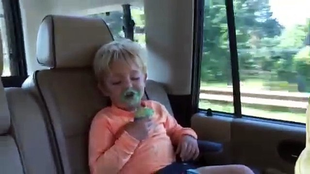Little Boy Falls Asleep while Eating Ice Cream