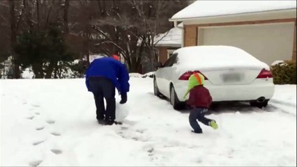 This Dad almost knocks out his Kid with giant Snowball!