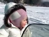 Little Kids Riding Mini Snowmobiles