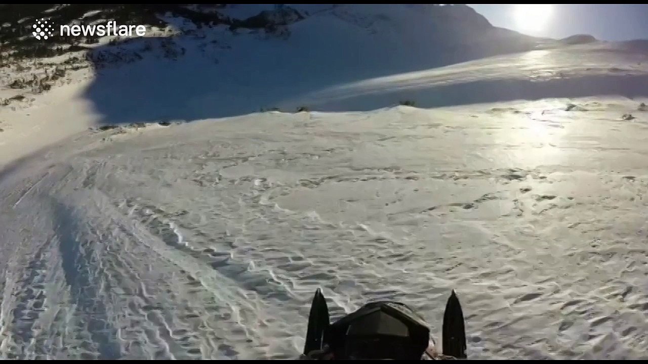 Snowmobile rider thrown off by hidden rocks