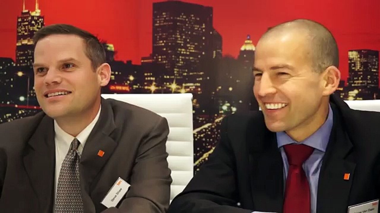 Fiserv- Steve Shaw and Serge Van Dam at Sibos 2012