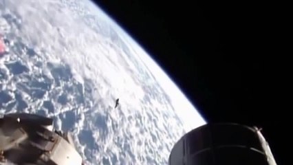 UFO 'spotted tracking the International Space Station' in footage taken from satellite's own cameras