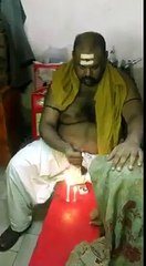 an Indian pandit making fun of ritual