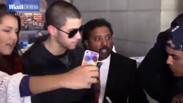 Nick Jonas spotted at LAX moments after Lily Collins