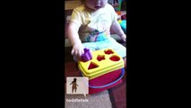 Toddler gives up trying to figure out which hole the shape fits in - Funny - toddletale