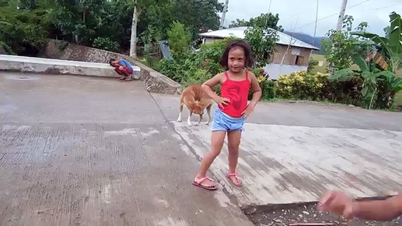 Cutest Little Filipino Girl showing me what she did in her Beauty Pageant.