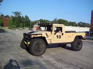 Humvee Climbing Vertical Wall