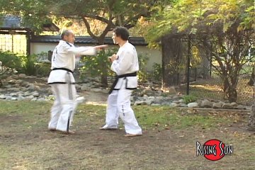 Grand Master Jong Soo Park - Mastering Taekwondo Black Belt Sparring