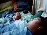 Baby scared by Dad's snoring while sleeping!