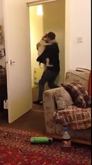 Dog is hugging a man, when it came home