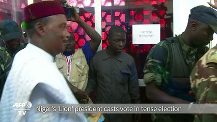 Niger's 'Lion' president casts vote in tense election
