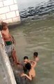 Street children jumped off from the Jones Bridge