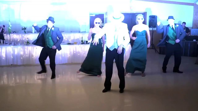 Groom Surprises Wedding Guests With The Smoothest Dance You'll EVER See!