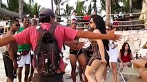 Hot Brazilian girl dancing sexy samba on the beach