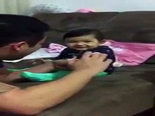 Check the Priceless Reaction of Baby when her Daddy is Cutting her Nails