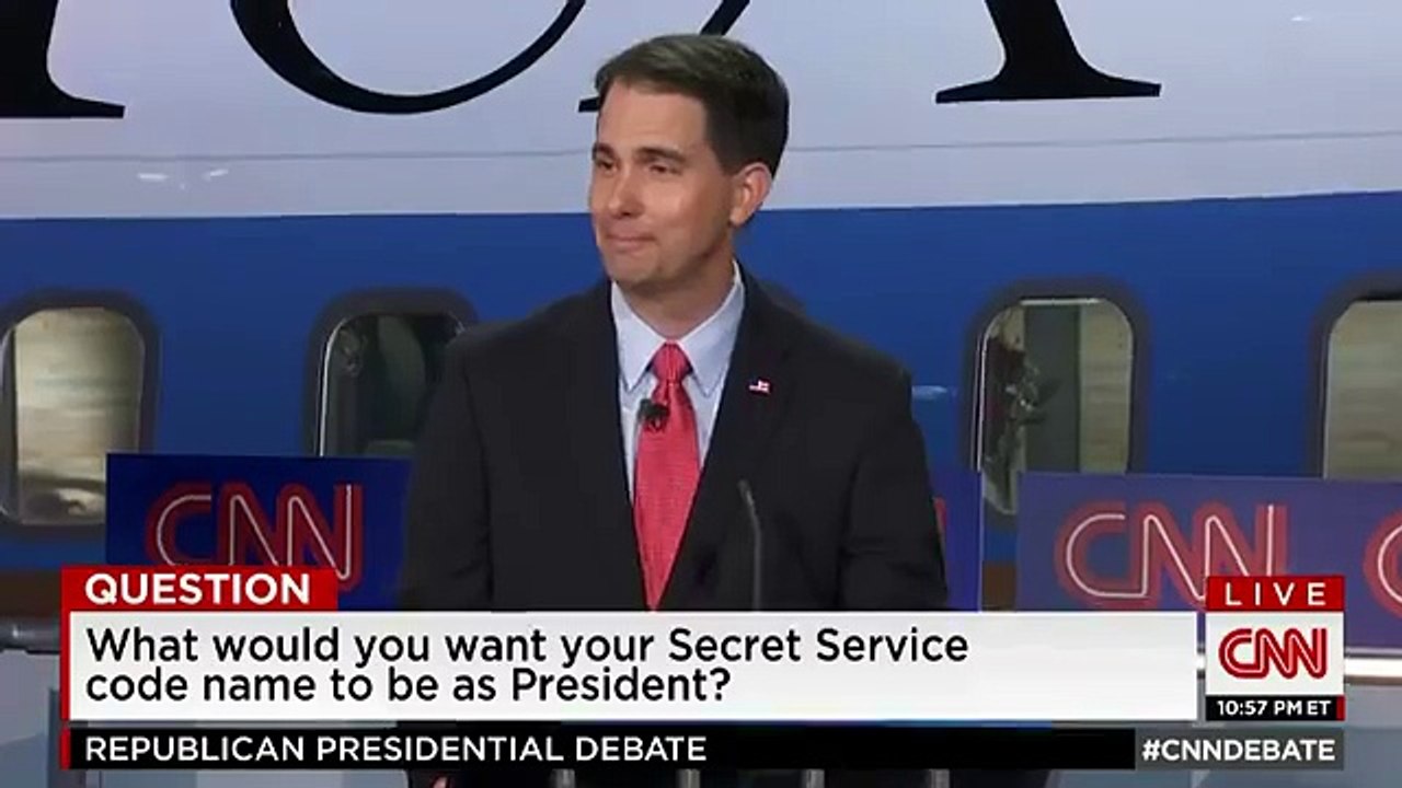 Trump gives Bush a low-five after debate joke