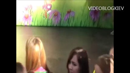 Young girls dancing at the concert,