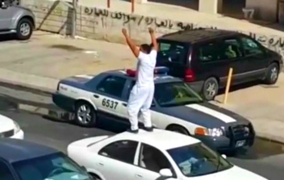 Drunk Arab Man Knocks Out a Cop With a Roundhouse Kick
