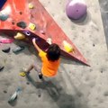 Rock Climbing Kid Swings Himself to Higher Rock