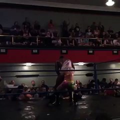 Wrestler Performs Back Breaking Move on Female Opponent