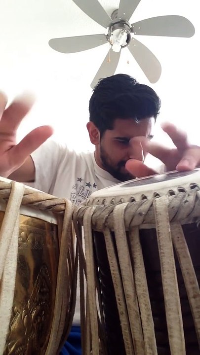 Guy plays tabla Indian Percussions to How Deep is You Love