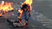 Caracas celebrates burning of Judas with Maduro and Obama Effigies