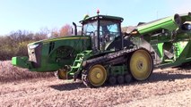 John Deere S690 Combines Unloading on the Go