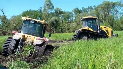big john deere tractor stuck in deep mud