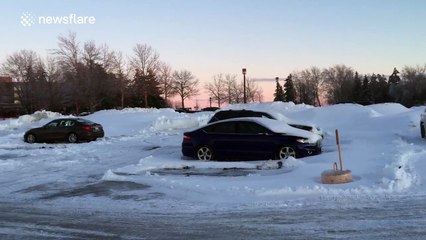 Ice sculpture in the shape of a car left behind after parked car moves